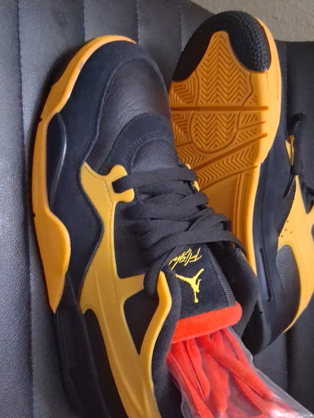 Jordan Black and Yellow Low-Top Sneakers